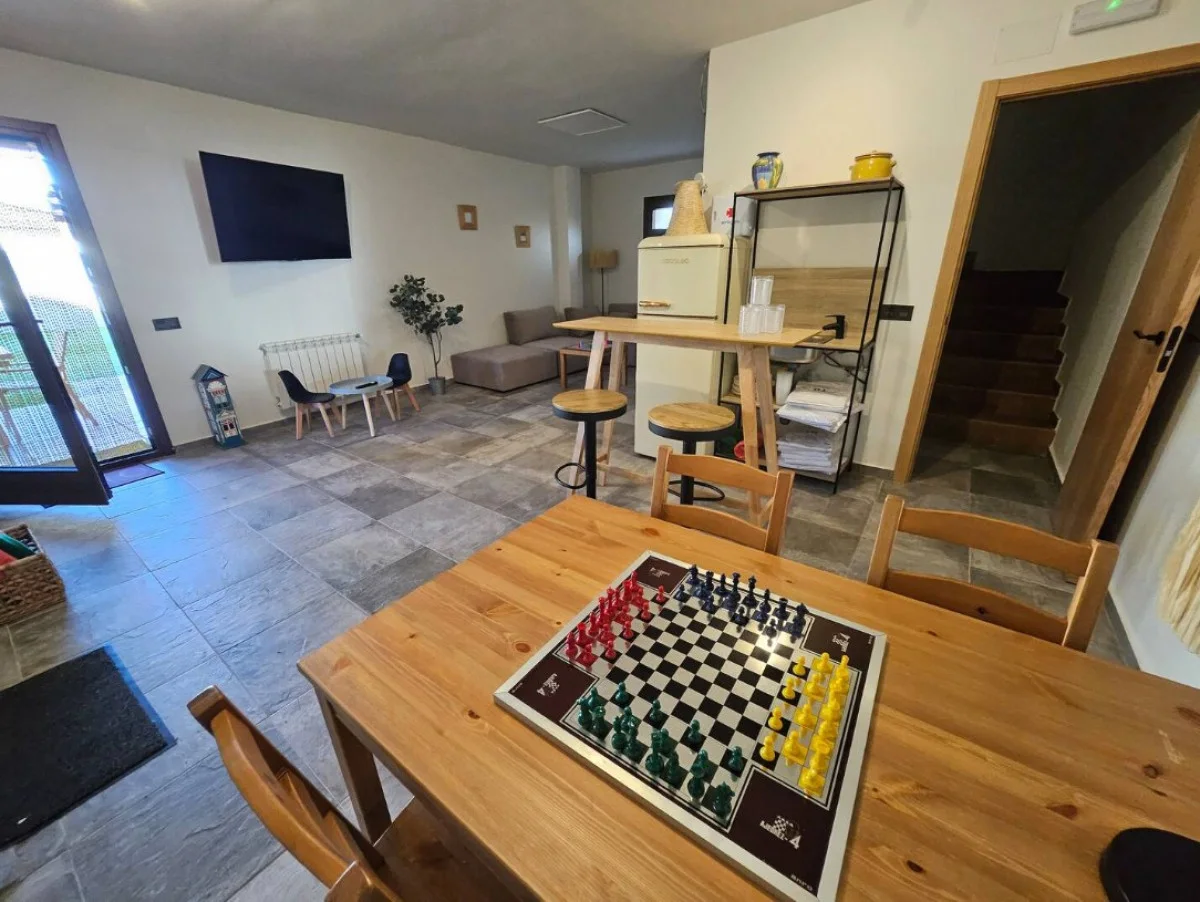 La mesa de juegos y la escalera